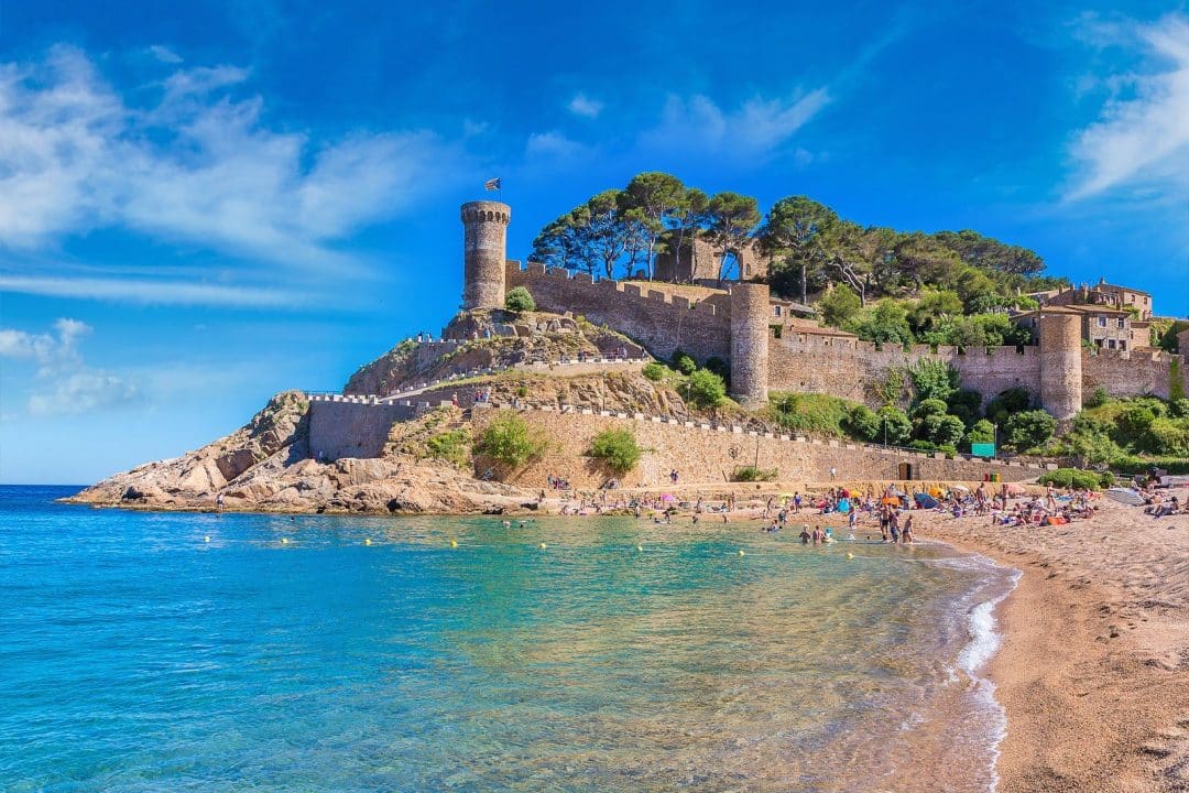 Tossa de Mar beach below the medieval walls of the Vila Vella, Costa Brava