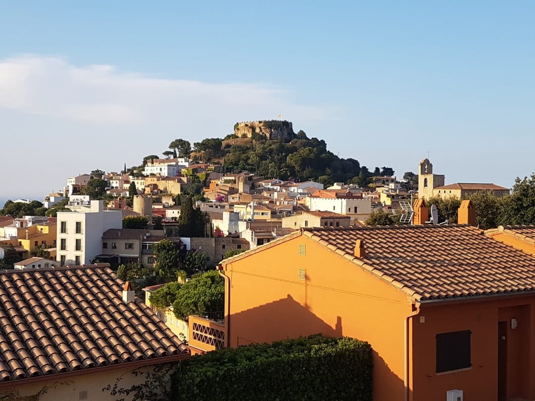 Begur village crowned by its castle ruins on the Costa Brava